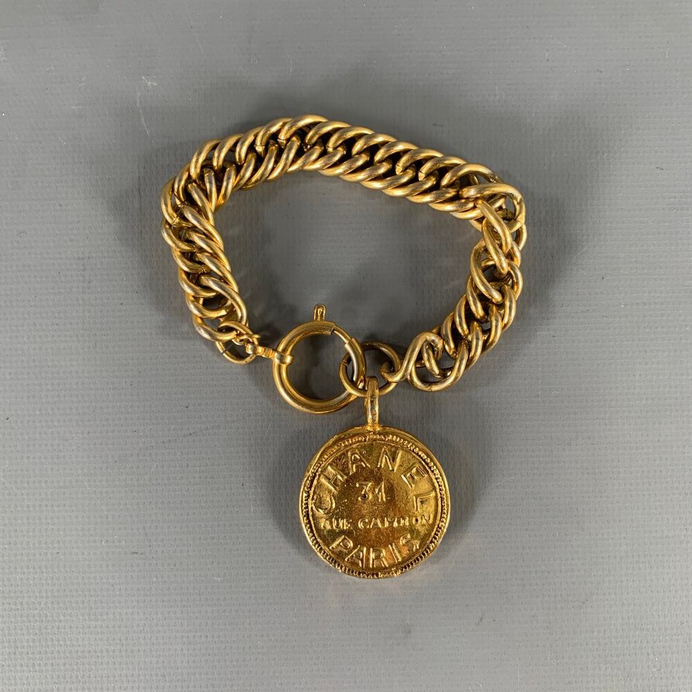 CHANEL Medallion 24k Gold Plated Charm Bracelet